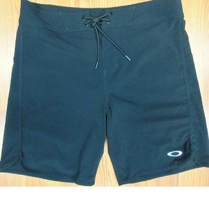 NEW! OAKLEY UNLINED PERFORMANCE FIT POLY/ELASTANE SWIM SHORTS BLACK Sz 32
